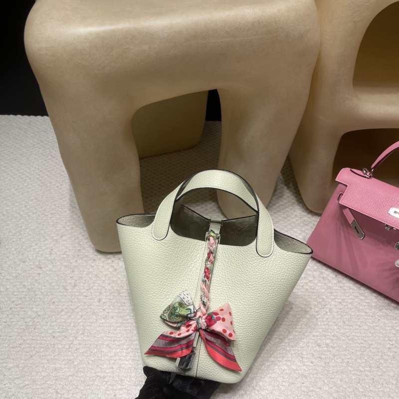 H**mes shopping bags